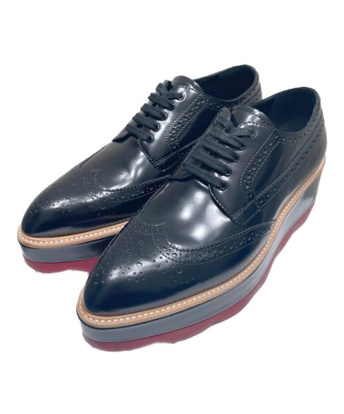 PRADA（プラダ）PRADA (プラダ) ウィングチッププラットフォームレザーシューズ ブラック×レッド サイズ:39 1/2の古着・服飾アイテム