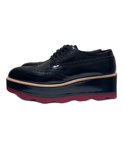 PRADA（プラダ）PRADA (プラダ) ウィングチッププラットフォームレザーシューズ ブラック×レッド サイズ:39 1/2の古着・服飾アイテム