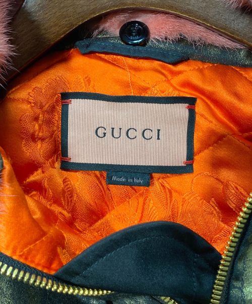 GUCCI（グッチ）GUCCI (グッチ) Trouble Andrew (トラブル アンドリュー) GUCCI GHOST MA-1 BOMBER JACKET ゴールド サイズ:38の古着・服飾アイテム