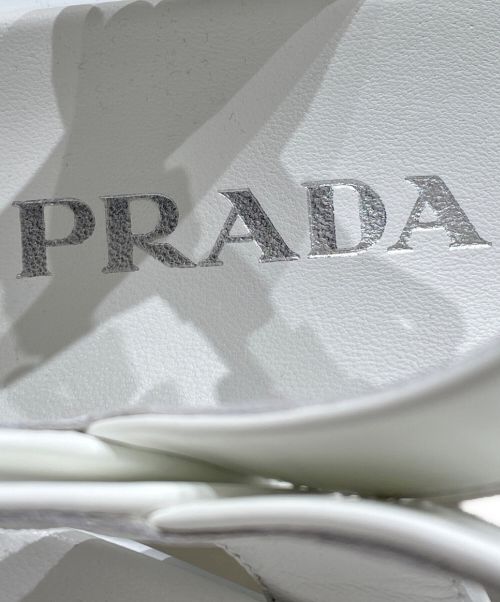 PRADA（プラダ）PRADA (プラダ) モノリスブラッシュドレザーサンダル ホワイト サイズ:36の古着・服飾アイテム