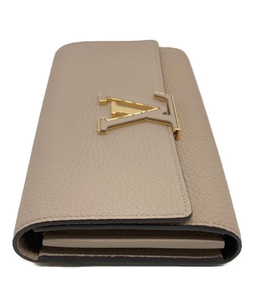 LOUIS VUITTON（ルイ ヴィトン）LOUIS VUITTON (ルイ ヴィトン) ポリトフォイユ カプシーヌ ベージュ 未使用品の古着・服飾アイテム