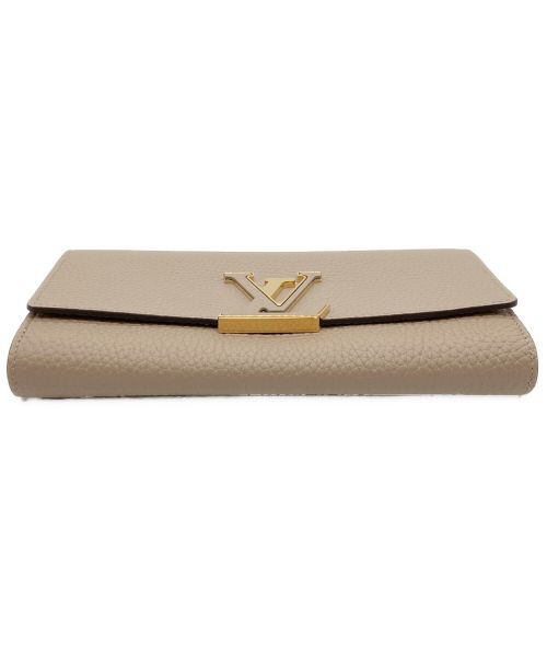 LOUIS VUITTON（ルイ ヴィトン）LOUIS VUITTON (ルイ ヴィトン) ポリトフォイユ カプシーヌ ベージュ 未使用品の古着・服飾アイテム