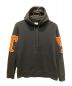 BURBERRY（バーバリー）の古着「LETTER GRAPHIC APPLIQUE HOODIE/レター グラフィック アップリケ フーディ―」｜ブラック×オレンジ