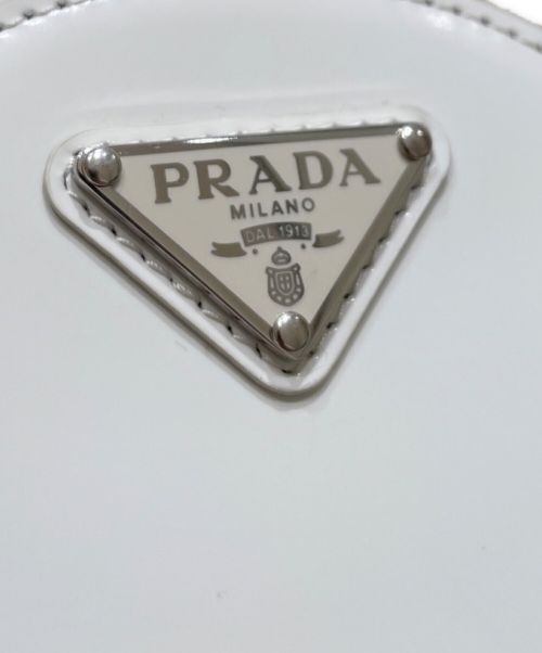 PRADA（プラダ）PRADA (プラダ) ラウンド ミニ ポーチ ホワイト サイズ:‐の古着・服飾アイテム