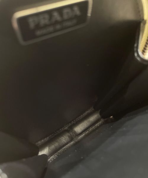 PRADA（プラダ）PRADA (プラダ) ラウンド ミニ ポーチ ホワイト サイズ:‐の古着・服飾アイテム