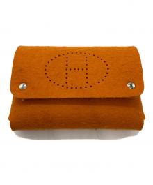 HERMES（エルメス）の古着「フェルトポーチ」｜オレンジ