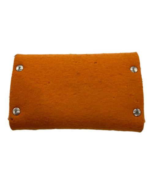 HERMES（エルメス）HERMES (エルメス) フェルトポーチ オレンジの古着・服飾アイテム