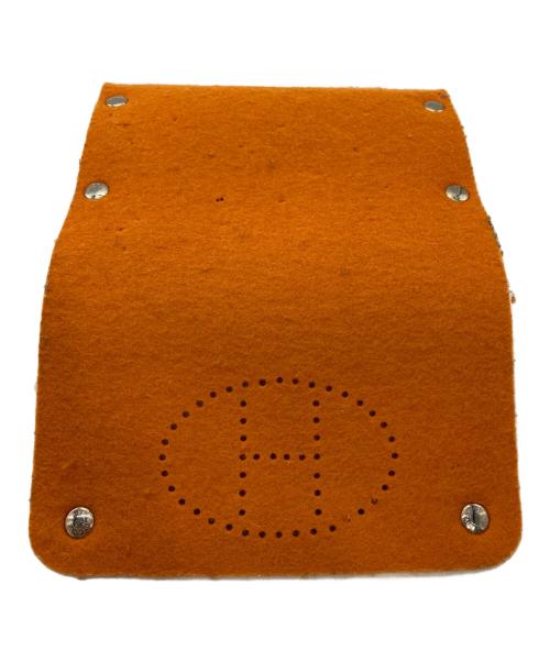 HERMES（エルメス）HERMES (エルメス) フェルトポーチ オレンジの古着・服飾アイテム