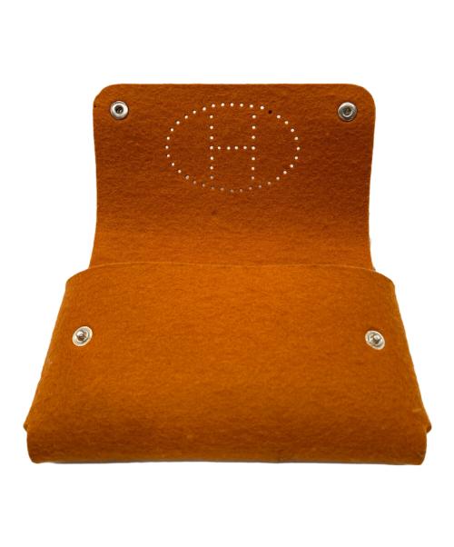 HERMES（エルメス）HERMES (エルメス) フェルトポーチ オレンジの古着・服飾アイテム