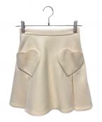 Christian Diorクリスチャン ディオール）の古着「Dioramour miniskirt with heart-shaped pockets ディオール ディオラムール ミニスカート」｜ベージュ