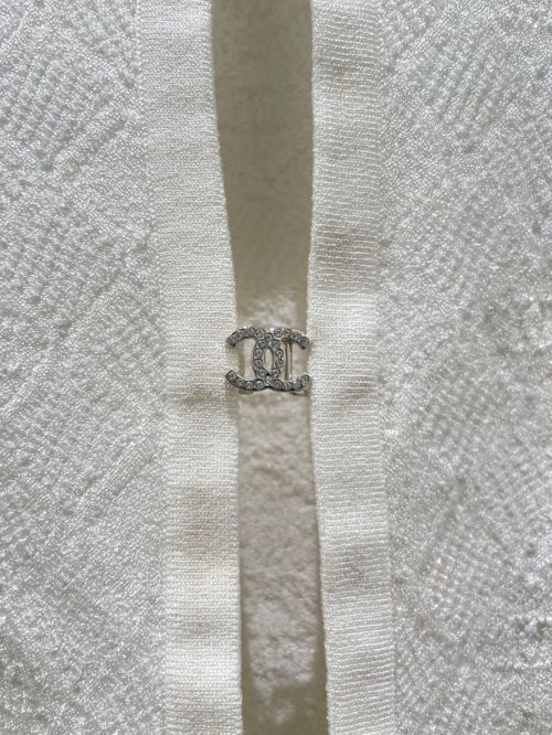 CHANEL（シャネル）CHANEL (シャネル) ココボタンニットカーディガン ホワイト サイズ:36の古着・服飾アイテム