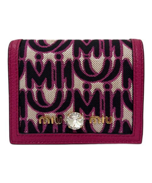 MIU MIU（ミュウミュウ）MIU MIU (ミュウミュウ) ロゴジャガードウォレット ピンク×ブラックの古着・服飾アイテム