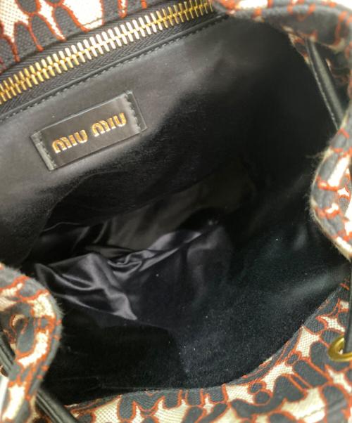 MIU MIU（ミュウミュウ）MIU MIU (ミュウミュウ) クリスタルバックパック ブラック×レッドの古着・服飾アイテム