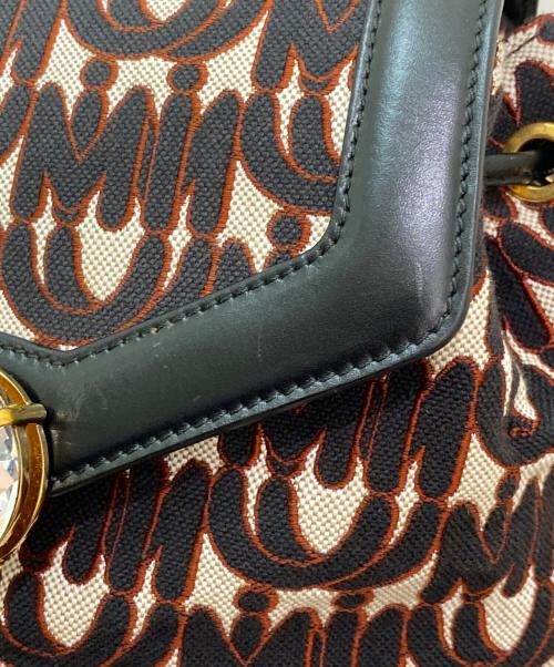 MIU MIU（ミュウミュウ）MIU MIU (ミュウミュウ) クリスタルバックパック ブラック×レッドの古着・服飾アイテム