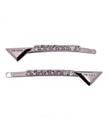 PRADA（プラダ）の古着「トライアングルロゴブラスヘアクリップ」｜シルバーカラー