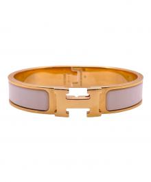 HERMES（エルメス）の古着「クリックH エナメルブレスレット」｜ゴールド×ホワイト