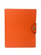 HERMESエルメス）の古着「ユリスMM / 手帳カバー」｜オレンジ×シルバー金具