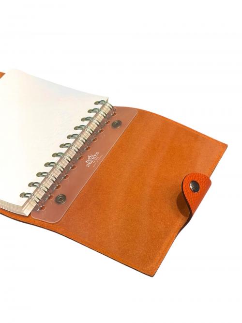 HERMES（エルメス）HERMES (エルメス) ユリスMM / 手帳カバー オレンジ×シルバー金具 サイズ:MMの古着・服飾アイテム