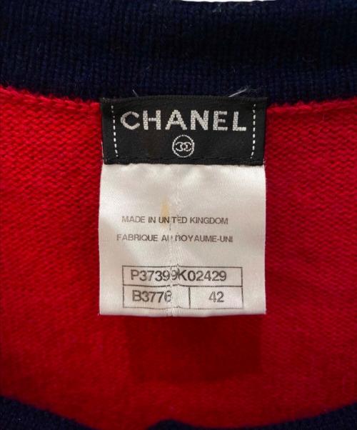 CHANEL（シャネル）CHANEL (シャネル) ライオン×ココマークボタン カシミヤカーディガン レッド×ネイビー サイズ:42の古着・服飾アイテム