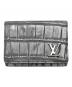 LOUIS VUITTON（ルイ ヴィトン）の古着「メタリック加工 エキゾチックレザーカードケース」｜グレー