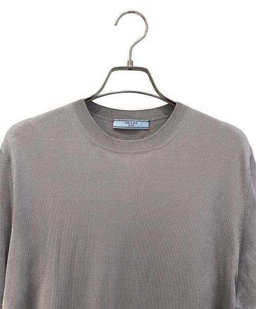 PRADA（プラダ）PRADA (プラダ) トライアングルモチーフ付半袖ニット グレー サイズ:36の古着・服飾アイテム