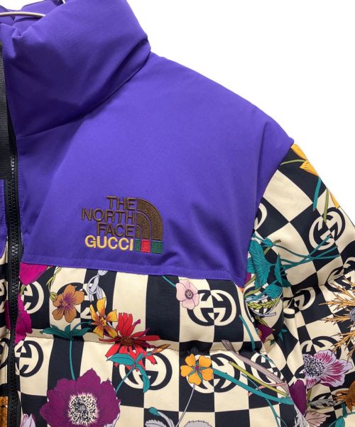 GUCCI×THE NORTH FACE（グッチ×ザノースフェイス）GUCCI×THE NORTH FACE (グッチ×ザノースフェイス) フラワーロゴ総柄ダウンジャケット パープル サイズ:XL 未使用品の古着・服飾アイテム