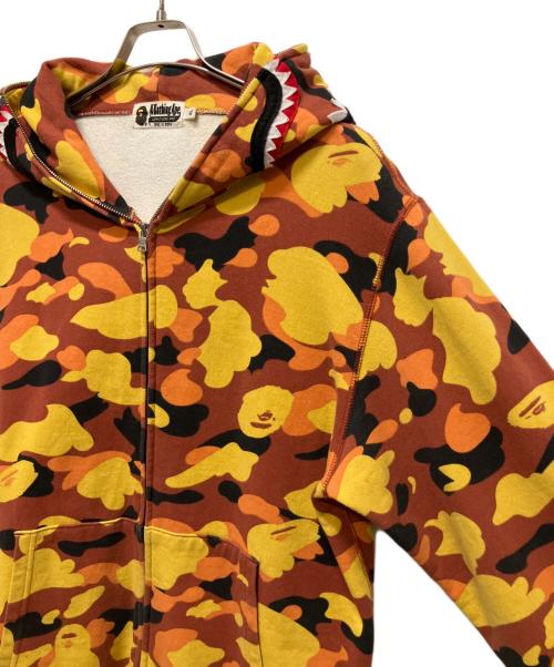 A BATHING APE（ア ベイシング エイプ）A BATHING APE (ア ベイシング エイプ) 1st CAMO SHARK FULL ZIP HOODIE オレンジ×イエロー サイズ:XLの古着・服飾アイテム