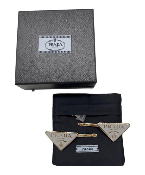 PRADA（プラダ）PRADA (プラダ) トライアングルプレートロゴ/ヘアクリップ ホワイト×ゴールド サイズ:-の古着・服飾アイテム