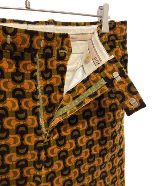GUCCI（グッチ）GUCCI (グッチ) 100周年 総柄ベロアフレアパンツ オレンジ×カーキ サイズ:50の古着・服飾アイテム