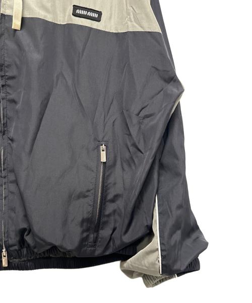 MIU MIU（ミュウミュウ）MIU MIU (ミュウミュウ) テクニカルシルクジップブルゾン ネイビー サイズ:36の古着・服飾アイテム