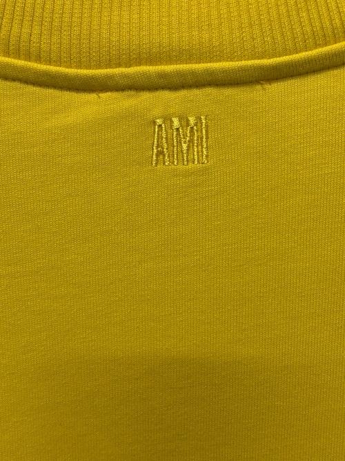 AMI Alexandre Mattiussi（アミアレクサンドルマテュッシ）AMI Alexandre Mattiussi (アミアレクサンドルマテュッシ) ネックロゴ 半袖カットソー イエロー サイズ:Lの古着・服飾アイテム