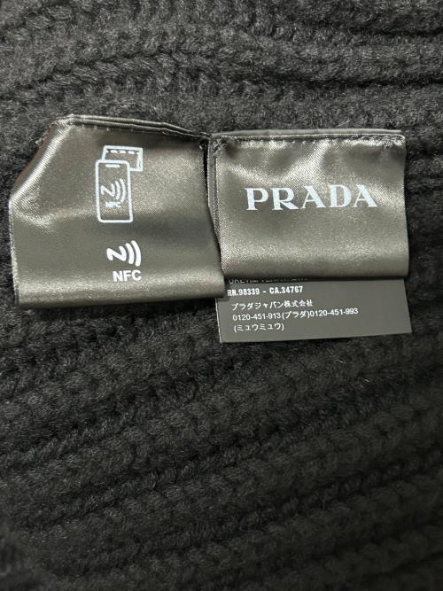PRADA（プラダ）PRADA (プラダ) ニットカーディガン／三角プレート/ケーブル編みニット/ドライバーズニット ブラック サイズ:48の古着・服飾アイテム