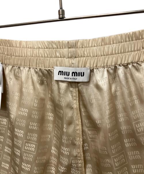 MIU MIU（ミュウミュウ）MIU MIU (ミュウミュウ) ロゴショートパンツ ベージュ サイズ:38の古着・服飾アイテム