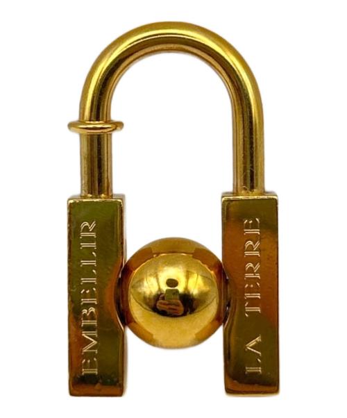 HERMES（エルメス）HERMES (エルメス) L'HOMME Peut EMBELLIR LA TERRE/テラカデナチャーム ゴールドの古着・服飾アイテム