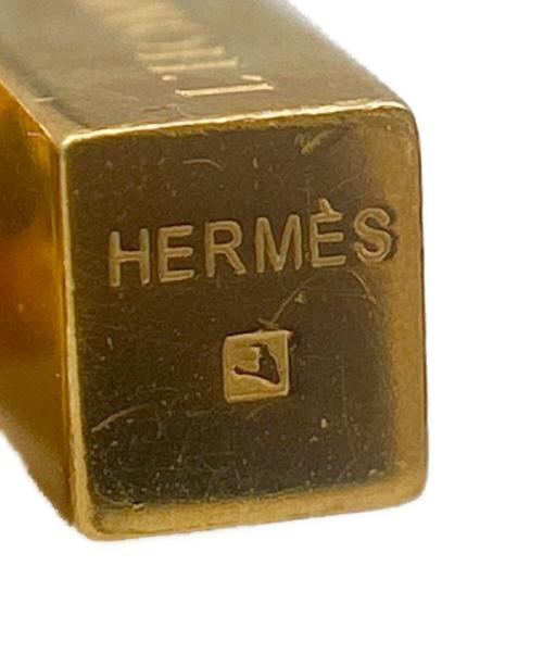 HERMES（エルメス）HERMES (エルメス) L'HOMME Peut EMBELLIR LA TERRE/テラカデナチャーム ゴールドの古着・服飾アイテム