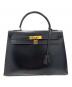 HERMES（エルメス）の古着「ケリー32外縫い/ボックスカーフ/ゴールド金具/〇O刻印/Kelly32 Sellier」｜ブラック×ゴールド
