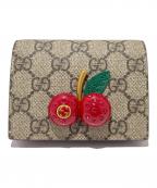 GUCCIグッチ）の古着「GGスプリーム チェリー コンパクトウォレット」｜ベージュ