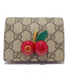 GUCCI（グッチ）の古着「GGスプリーム チェリー コンパクトウォレット」｜ベージュ