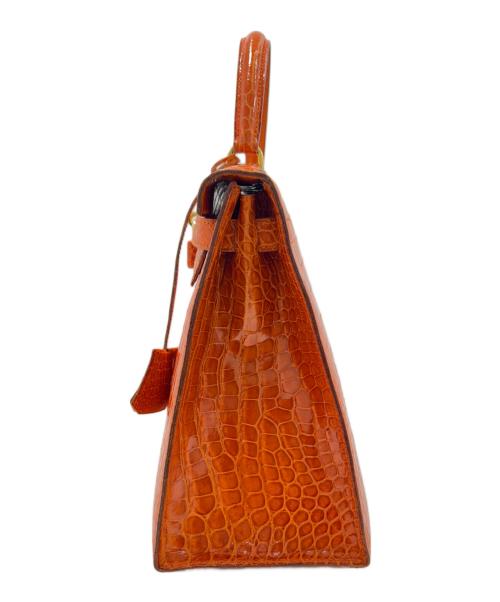 HERMES（エルメス）HERMES (エルメス) Kelly 28 Sellier/ケリー28 外縫い/ゴールド金具/ポロサスリセ/オレンジ系/〇X刻印：1994年製 オレンジ系/ゴールド金具 サイズ:28の古着・服飾アイテム