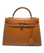 HERMESエルメス）の古着「ケリー32外縫い/Kelly32Sellier/ゴールド/ゴールド金具/〇U刻印」｜ゴールド×G金具