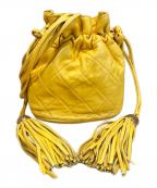 CHANELシャネル）の古着「タッセル巾着バッグ」｜イエロー