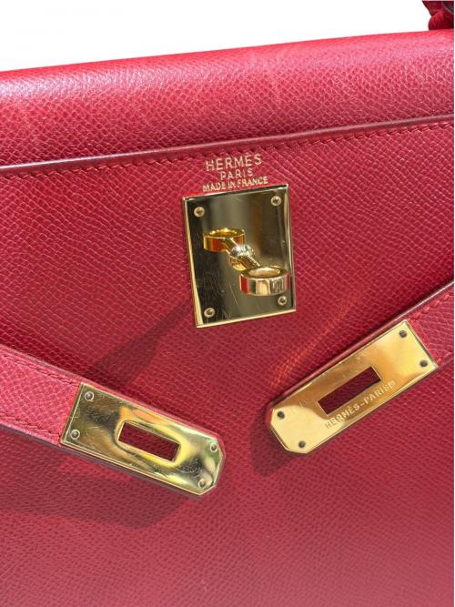 HERMES（エルメス）HERMES (エルメス) Kelly 28 ケリー 28/外縫い/クシュベル/レッド系/〇X刻印：1994年製造/ゴールド金具 レッド系 サイズ:28の古着・服飾アイテム