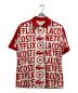 LACOSTE（ラコステ）の古着「『Lacoste x Netflix』 オーバーサイズ総柄ポロシャツ」｜レッド