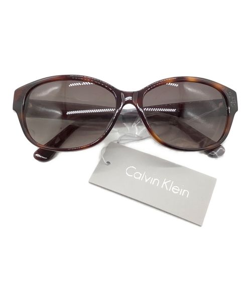 Calvin Klein（カルバンクライン）Calvin Klein (カルバンクライン) オーバルサングラス ブラウンの古着・服飾アイテム