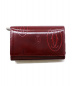 Cartier（カルティエ）の古着「Happy Birthday/二つ折り財布」｜レッド