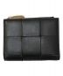 BOTTEGA VENETA（ボッテガベネタ）の古着「スモールカセット 2つ折り財布」｜ブラック