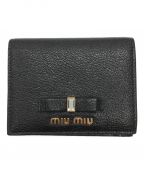 MIU MIU（ミュウミュウ）の古着「マドラス2つ折り財布」｜ブラック