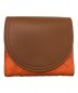 BOTTEGA VENETA（ボッテガベネタ）の古着「イントレチャート 2つ折り財布」｜オレンジ