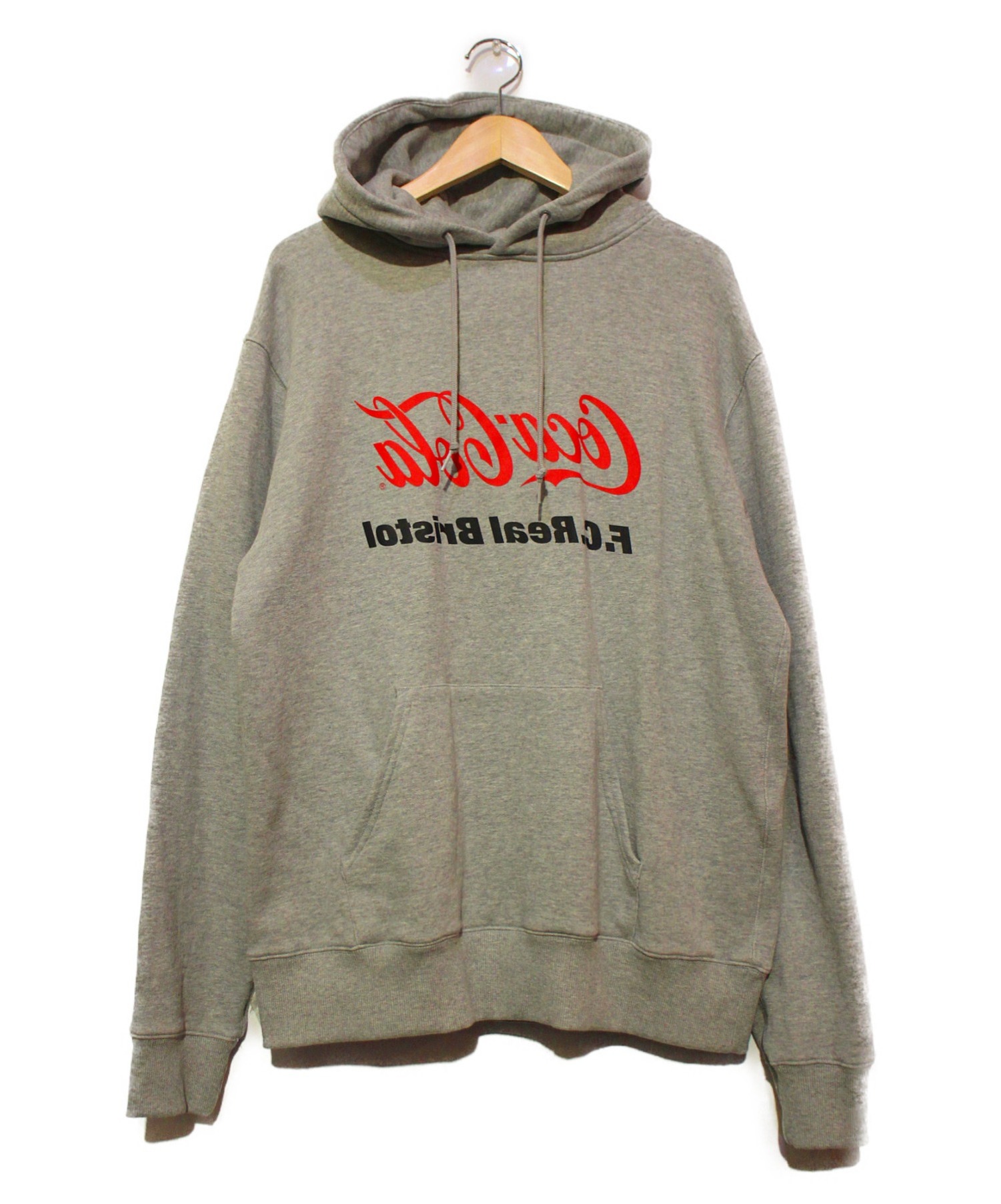 中古 古着通販 F C R B Coca Cola エフシーレアルブリストル コカコーラ コラボコカコーラミラーロゴプルオーバーパーカー グレー サイズ L ss Fcrb 016 Coca Col ブランド 古着通販 トレファク公式 Trefac Fashion