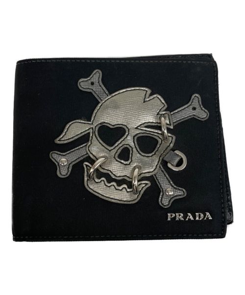 PRADA（プラダ）PRADA (プラダ) スカルデザイン2つ折り財布 ブラックの古着・服飾アイテム